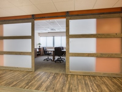 Sliding Barn Door Entry to Conference Room at Integral Building Systems
